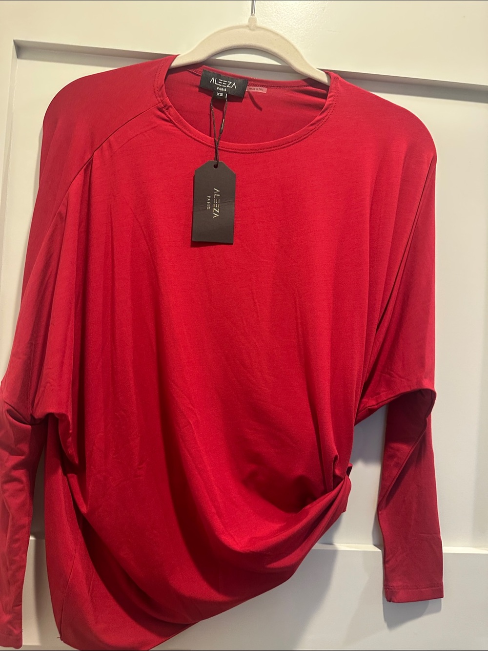 Aleeza Red Long-Sleeve Twist-Hem Top with matching skirt